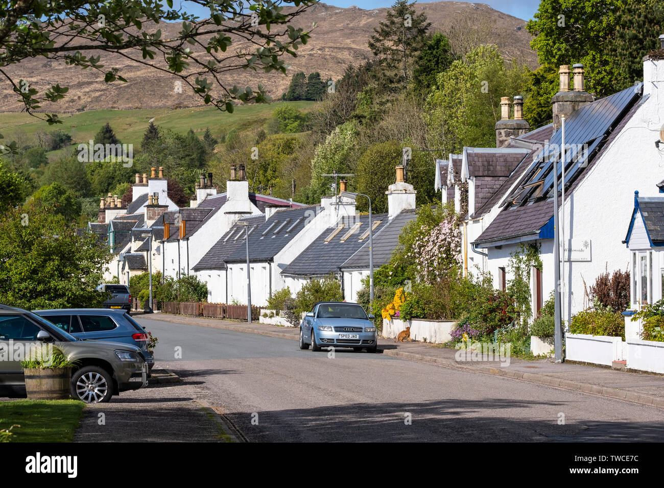 Main Street, Lochcarron village on the edge of tidal Loch Carron in the NW Highlands of Scotland.  A896 and part of North Coast 500 Stock Photo