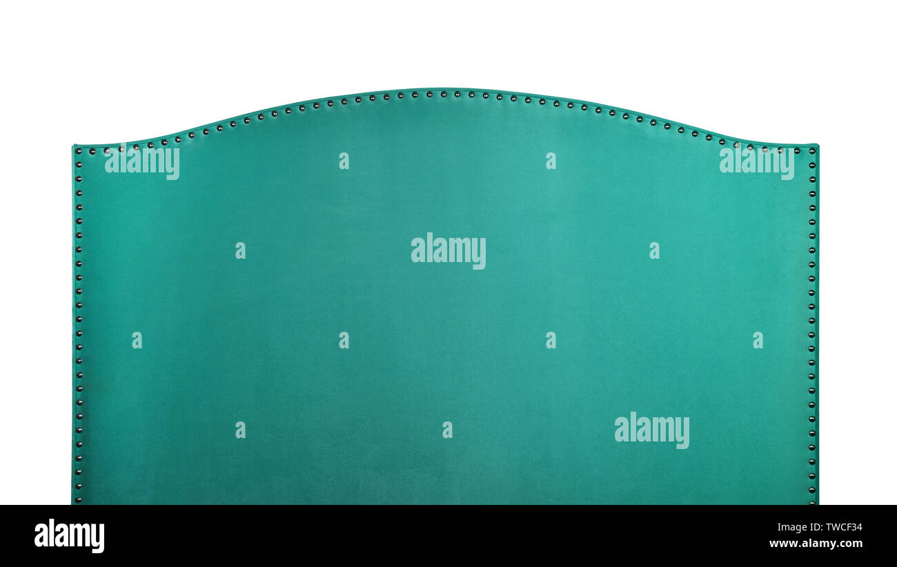 Turquoise green soft velvet fabric shaped bed headboard isolated on white background, front view Stock Photo