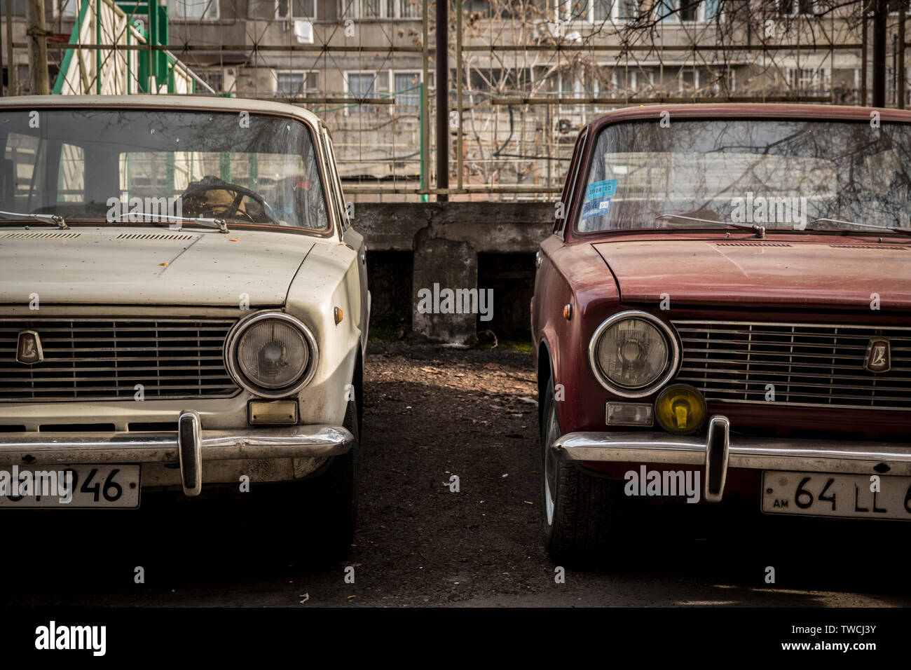 Red and white Lada cars parked in Yerevan. Armenia Stock Photo