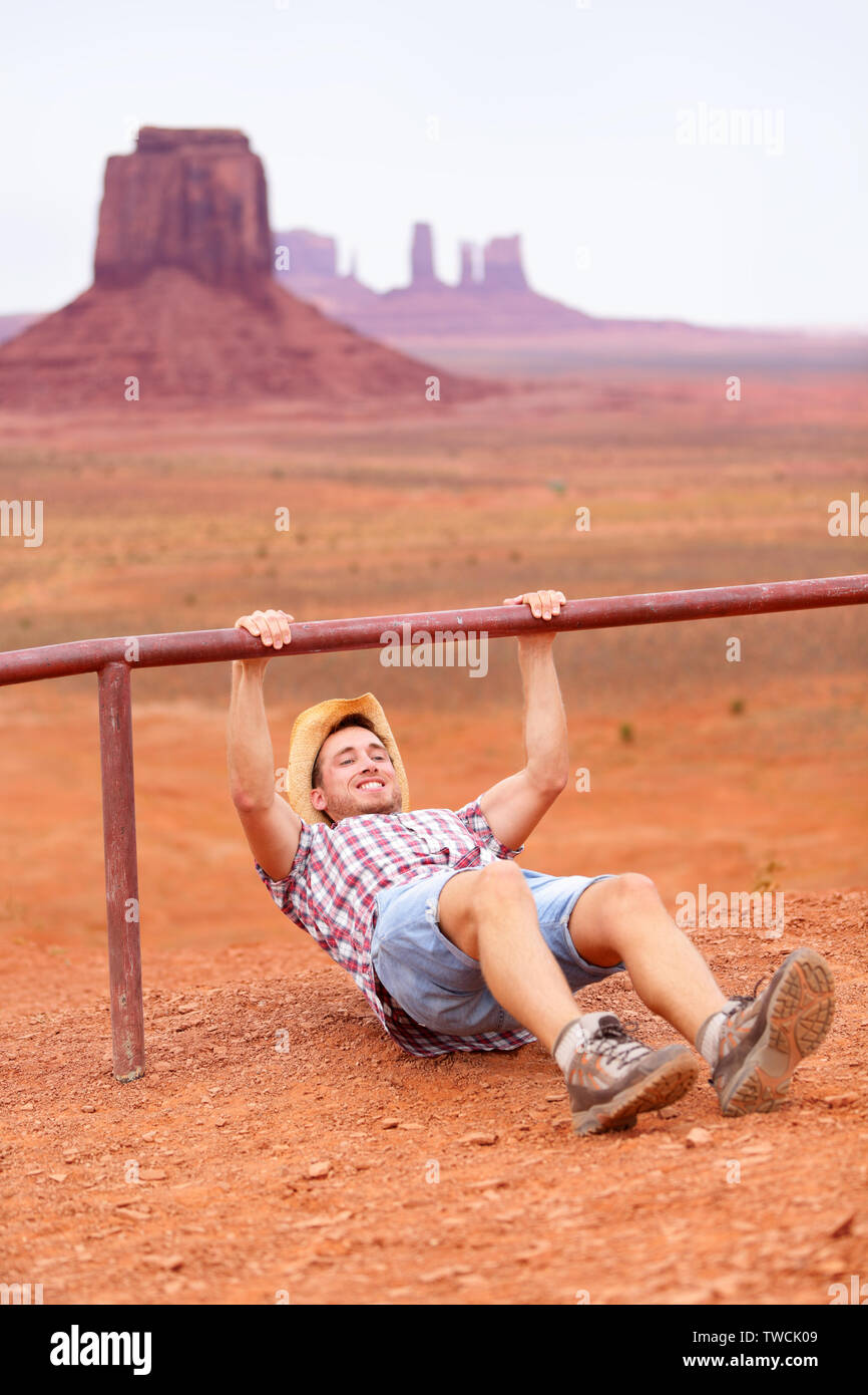 Fitness man training outdoors working out in amazing american landscape