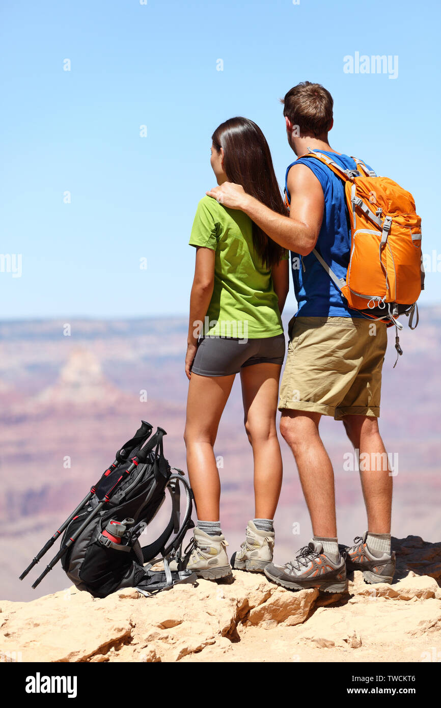 people enjoying nature on People Hiking Hikers In Grand Canyon Hiking Couple Looking Enjoying At View Of Nature Landscape Wearing