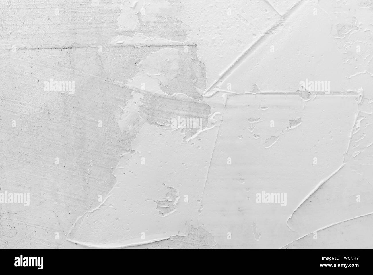 Texture of white plaster. Covering the concrete wall of the house