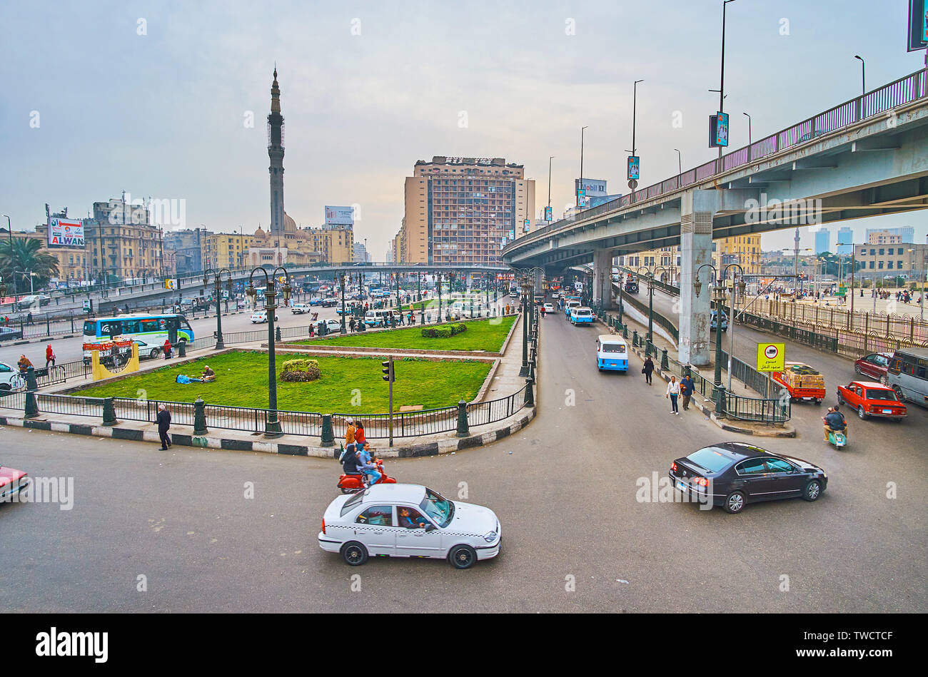 CAIRO, EGYPT - DECEMBER 22, 2017: Midan Ramses square with its complex ...