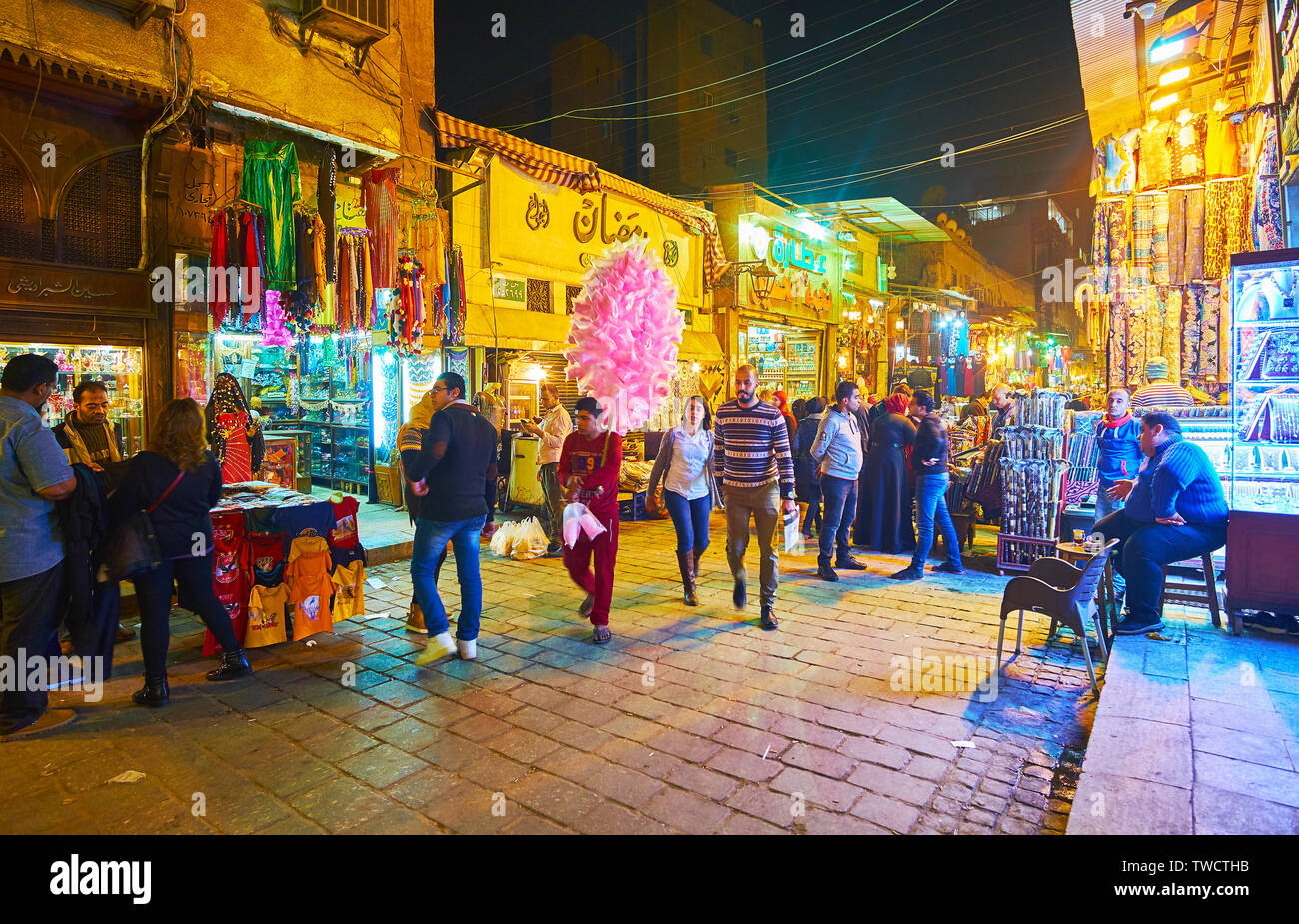 CAIRO, EGYPT - DECEMBER 22, 2017: Khan El Khalili bazaar is especially interesting in the evening, all the stalls are brightly illuminated and boasts Stock Photo