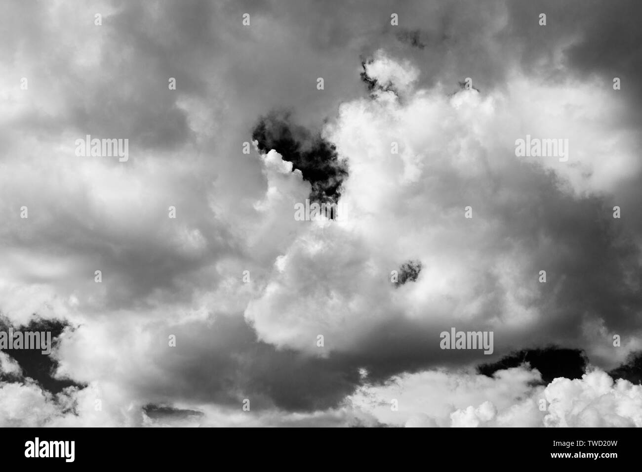 Atmospheric blue cloud clouds sky Black and White Stock Photos & Images ...