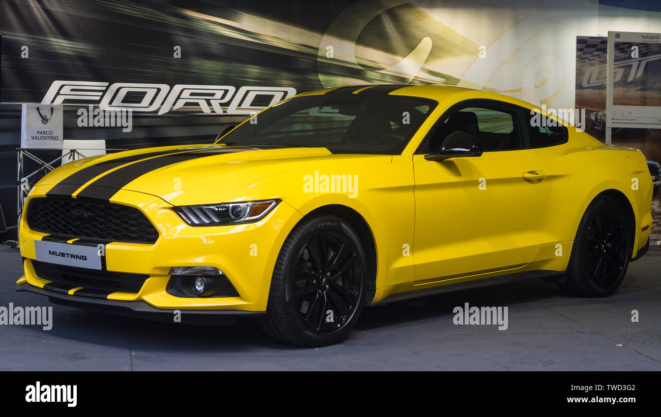 A yellow Ford Mustang GT. 2019 edition of Parco Valentino car show
