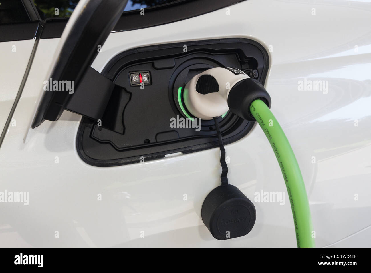 Detail of charging plug of Peugeot 508 SW hybrid. 2019 edition of Parco Valentino car show hosts cars by many brands and car designers in Valentino Park in Torino, Italy. Stock Photo