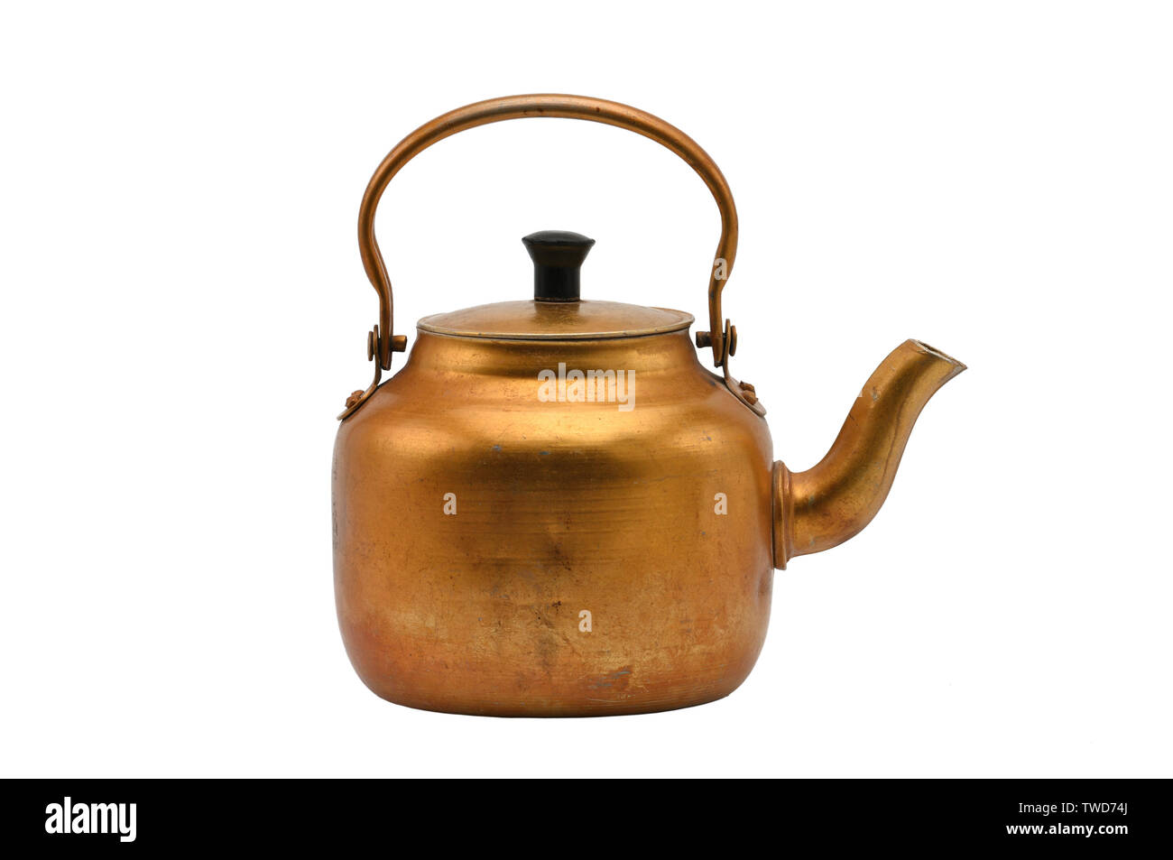 Gilded metal kettle on an isolated white background.Golden teapot Stock Photo Alamy