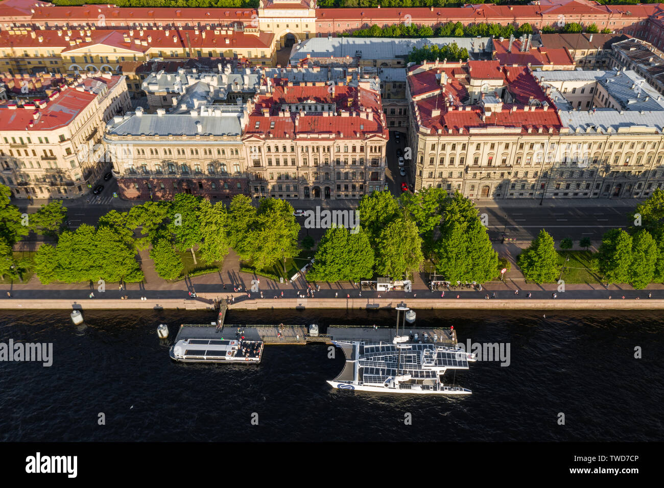 The French Catamaran Energy Observer against sights of the city, working for pure and renewables source of energy, solar energy, wind power, Admiralty Stock Photo