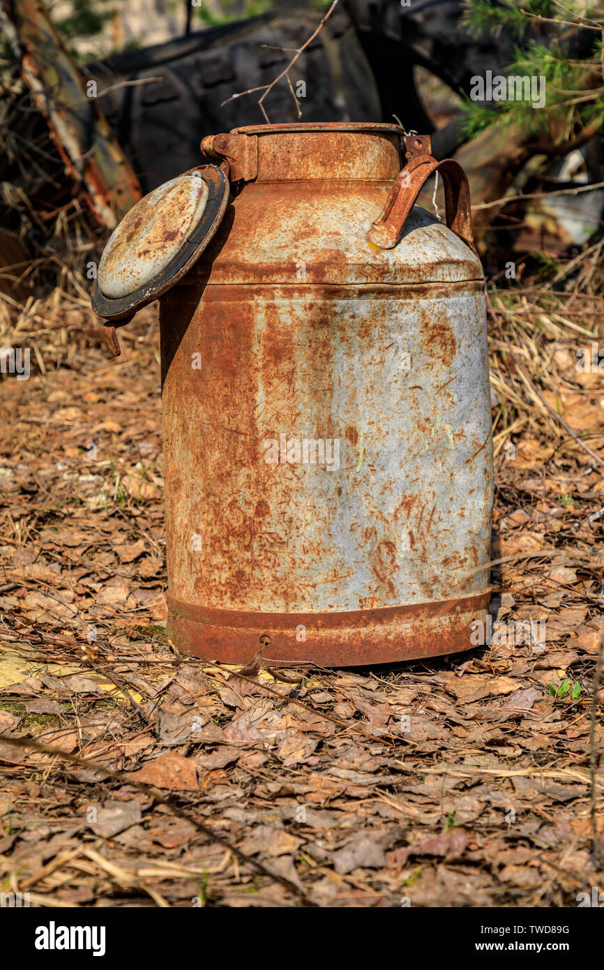 Eastern Europe, Ukraine, Pripyat, Chernobyl. Rusted milk can. Stock Photo