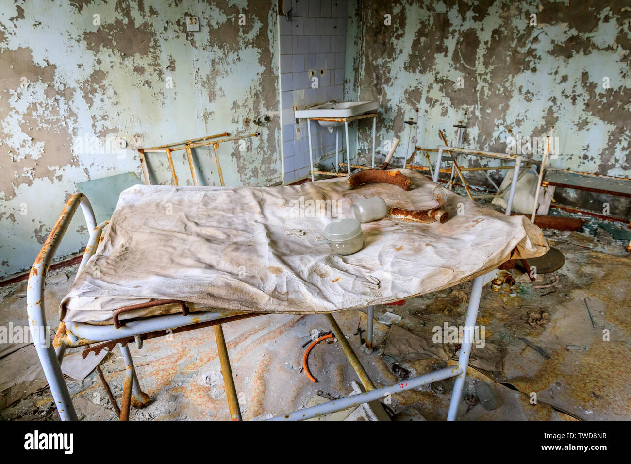Eastern Europe, Ukraine, Pripyat, Chernobyl. The Hospital MsCh-126 (medical-sanitary unit). Hospital bed. Stock Photo