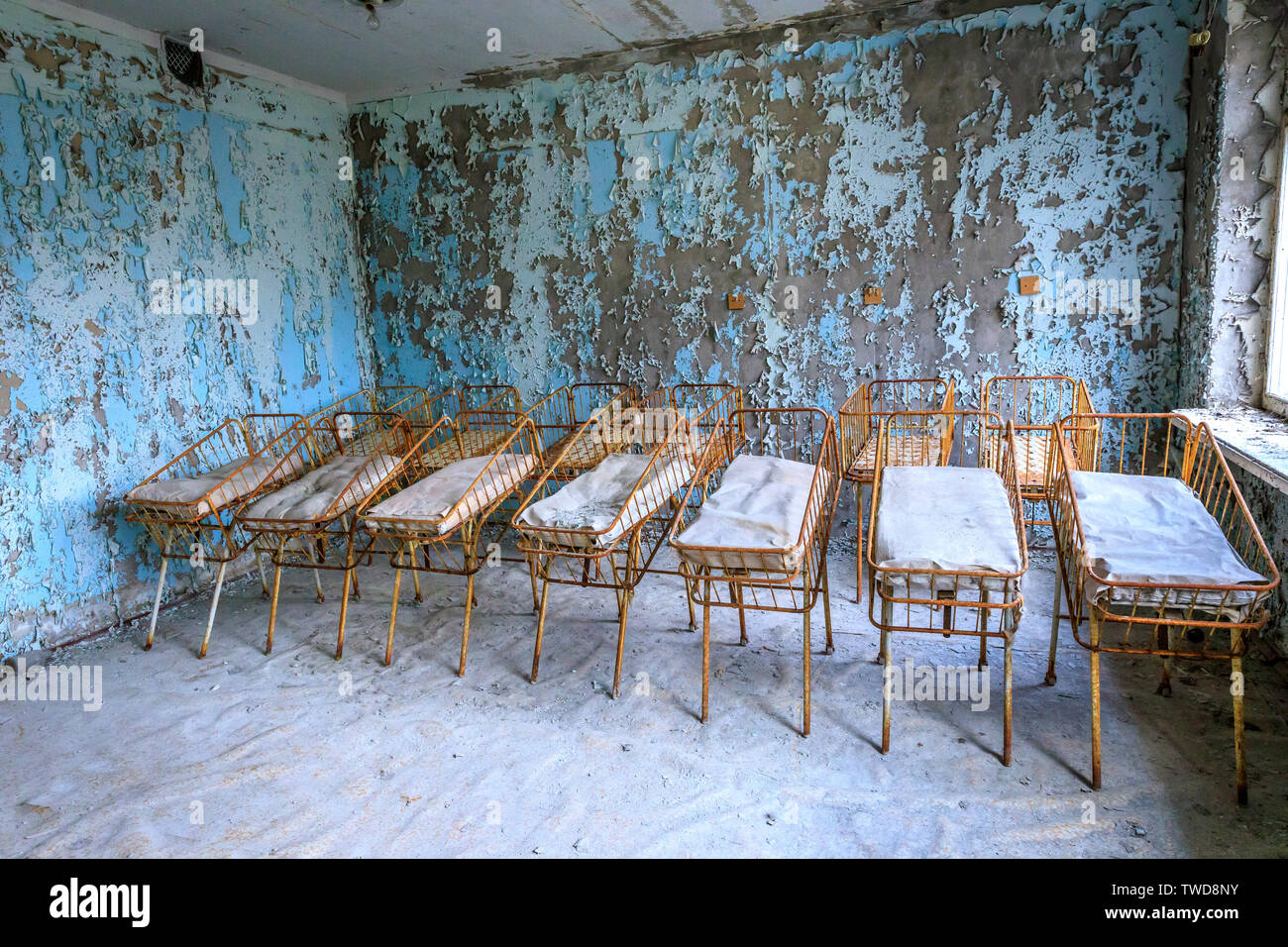 Eastern Europe, Ukraine, Pripyat, Chernobyl. The Hospital MsCh-126 (medical-sanitary unit). Infant beds in maternity area. Stock Photo