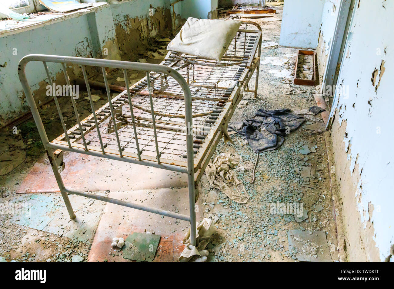 Eastern Europe, Ukraine, Pripyat, Chernobyl. The Hospital MsCh-126 (medical-sanitary unit). Bed. Stock Photo