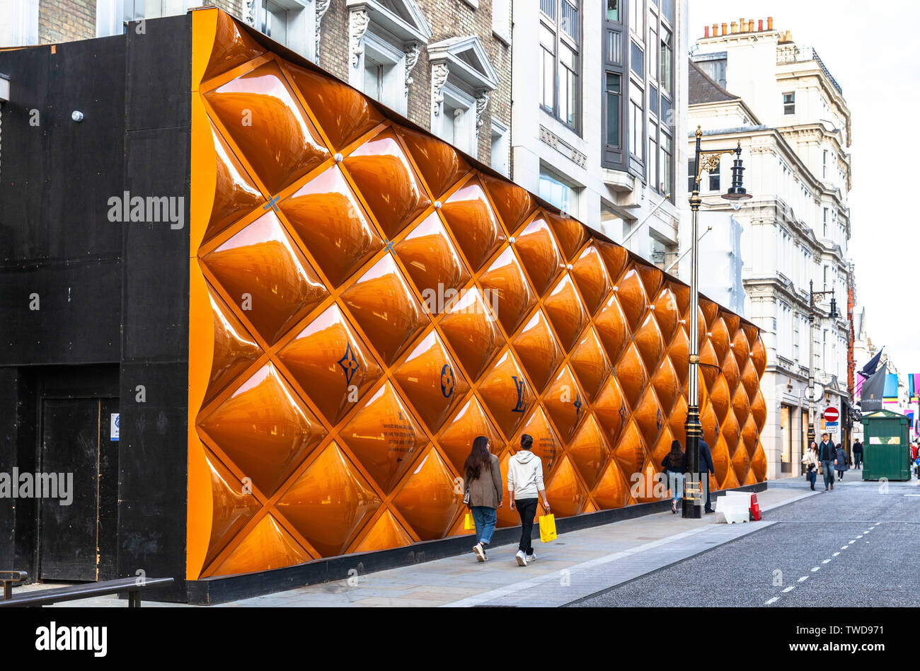 Louis Vuitton large advertising hoarding on New Bond street, London, England, UK. Stock Photo