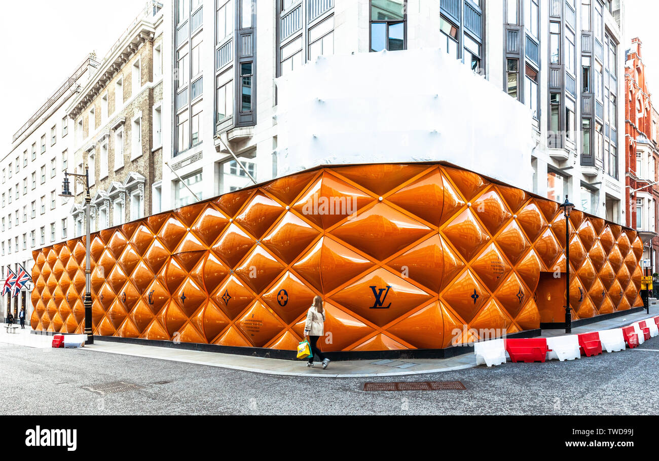 Louis Vuitton large advertising hoarding on New Bond street, London,  England, UK Stock Photo - Alamy