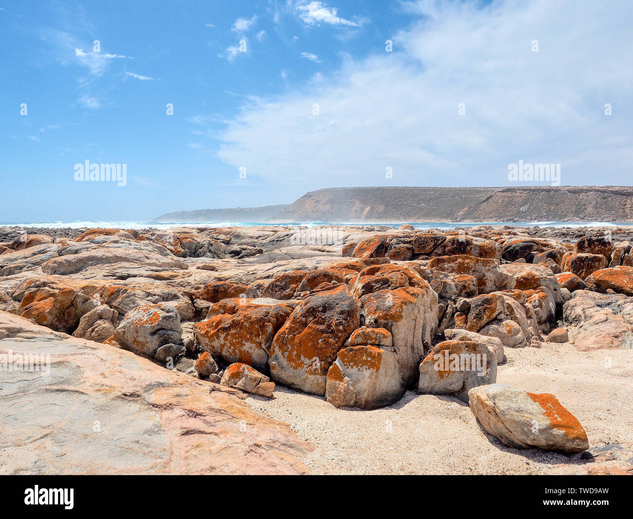 Colorful rocks and boulders at rocky sea shore Stock Photo - Alamy