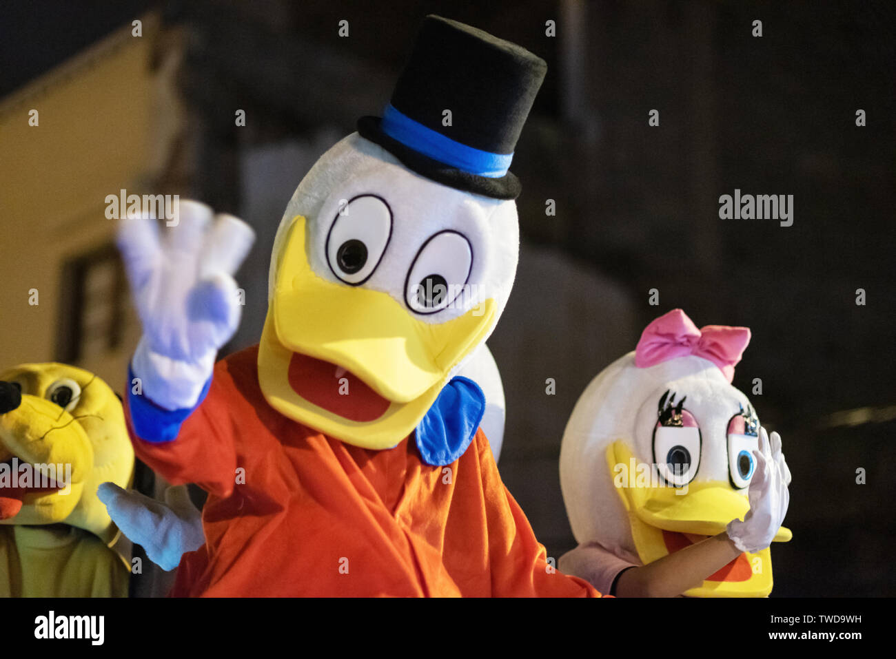 Tenerife, Spain - January 5, 2019: Disguised cartoon characters during Three kings parade celebration. Cabalgata de Reyes magos is a traditional epiphany Spanish celebration .  Stock Photo