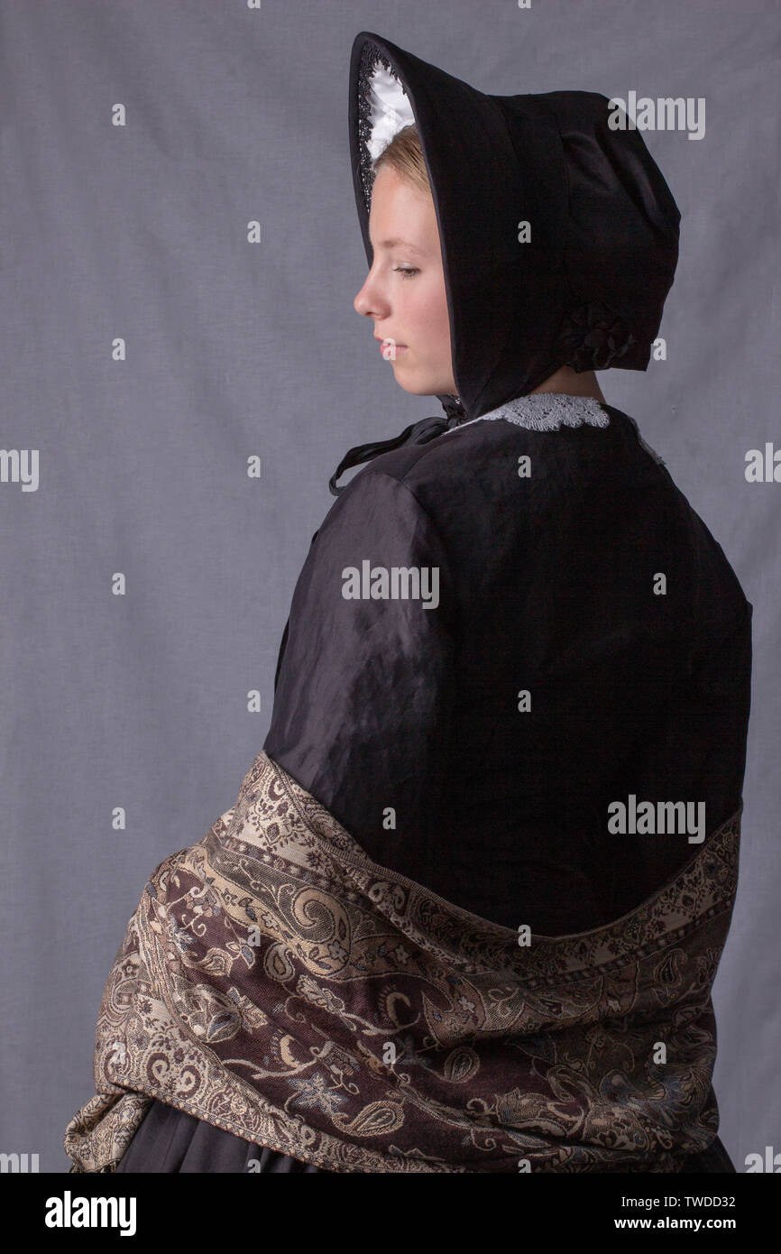 Young Victorian woman in black ensemble Stock Photo