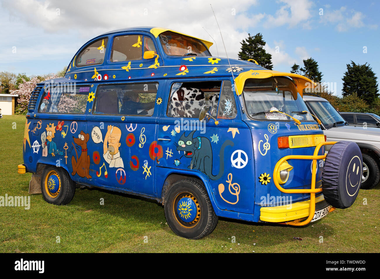 Old VW bus, known as 'Bully', with VW beetle top, painted with motives of the comic telecast 'The Simpsons', Ramsgate, Kent, England, Great Britain Stock Photo