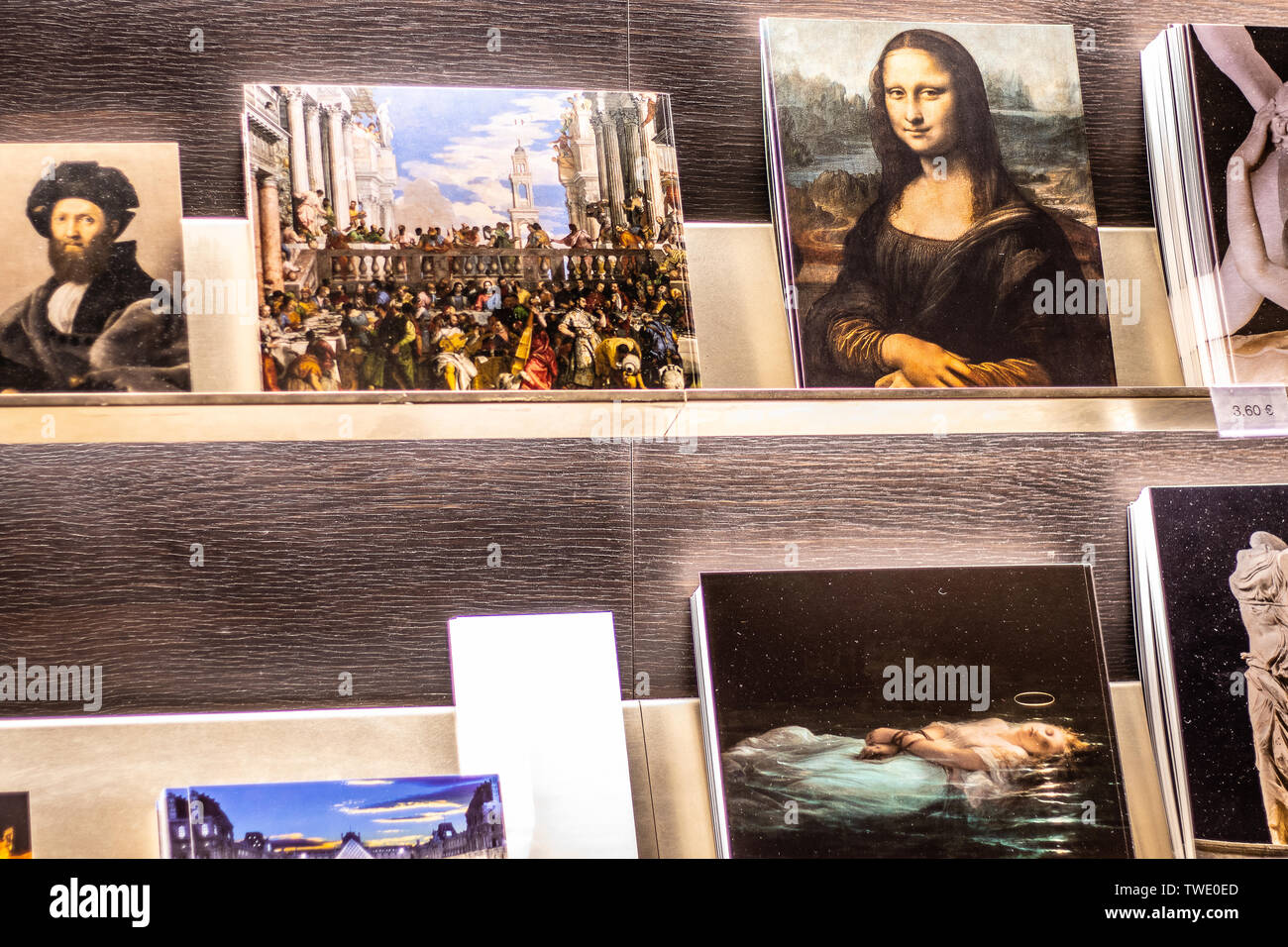 Paris, France, October 07, 2018: Louvre Museum, souvenirs for sale, tourist loot of famous painting Mona Lisa La Gioconda Leonardo da Vinci Stock Photo