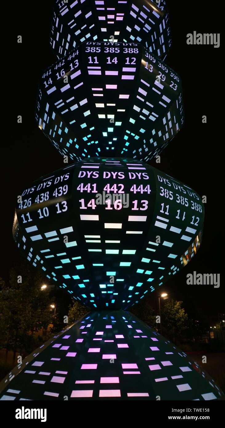 Lighted tech sculpture with numbers at night, near Amtrak Station, Emeryville, California, USA Stock Photo
