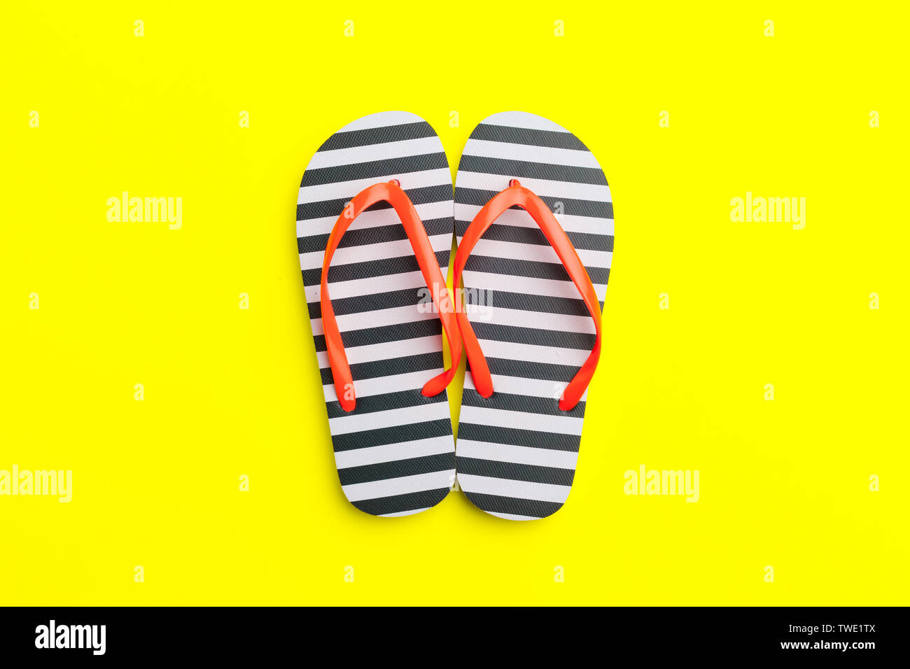 Female flip flops on a colorful vibrant background Stock Photo - Alamy