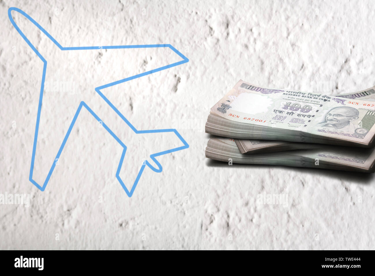 Airplane with bundles of hundred rupees banknotes Stock Photo Alamy