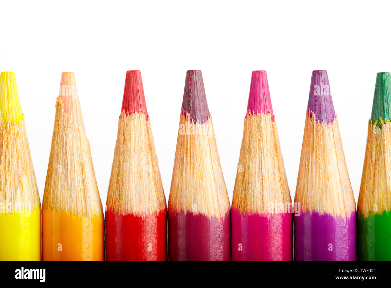 Assorted colored pencils in a row Stock Photo