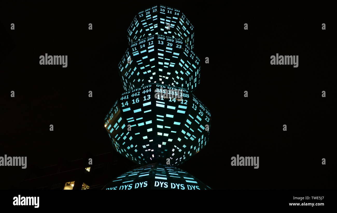 Lighted tech sculpture with numbers at night, near Amtrak Station, Emeryville, California, USA Stock Photo