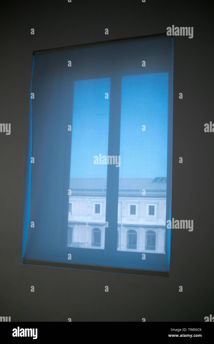 Window in the former hospital building with natural daylight streaming ...