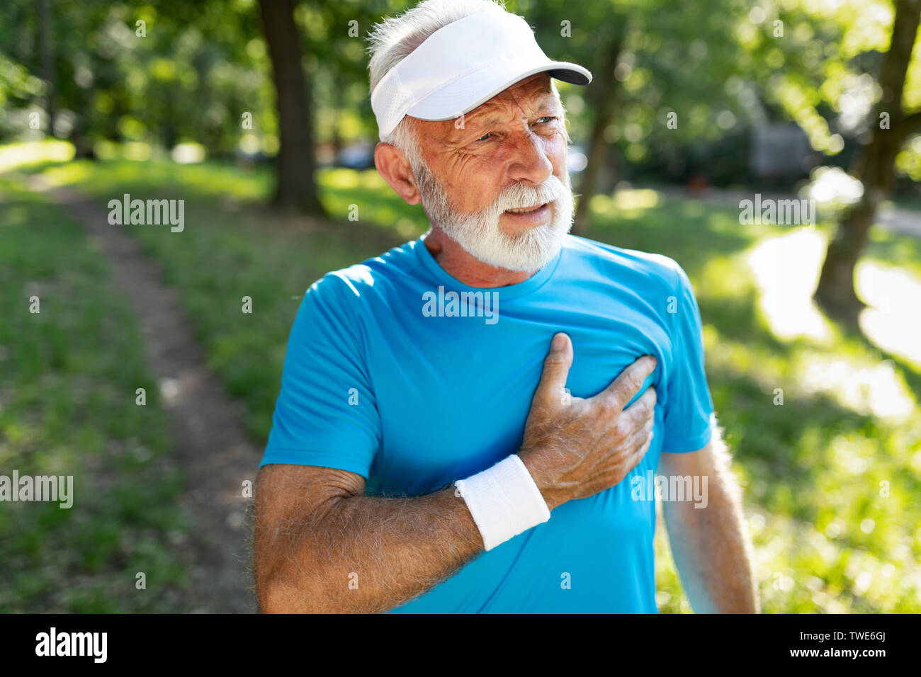 Older man heart attack after running workout outdoor Stock Photo Alamy