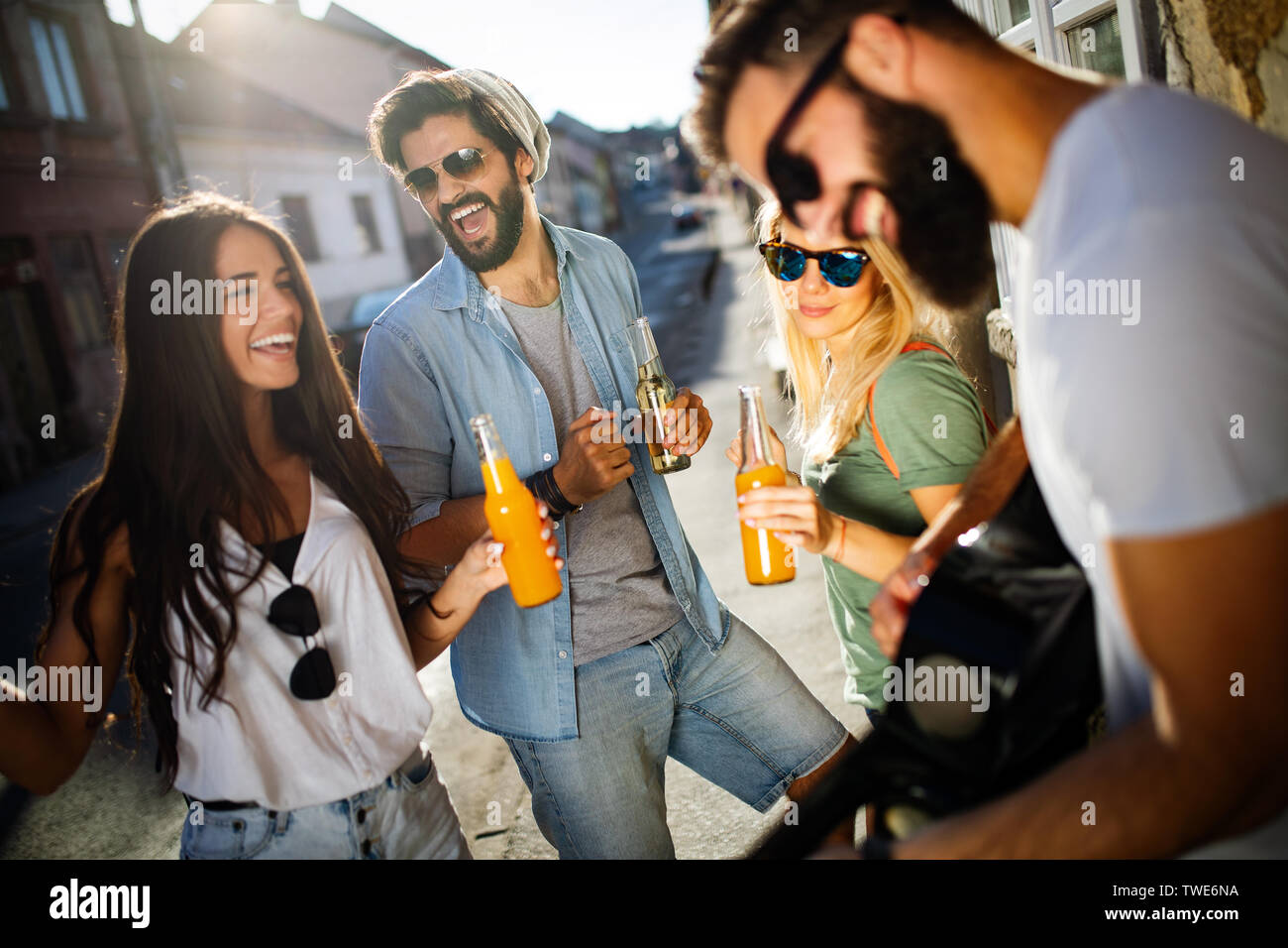 Out Having Fun Group of friends hanging out, having fun and enjoying summer days Stock ...