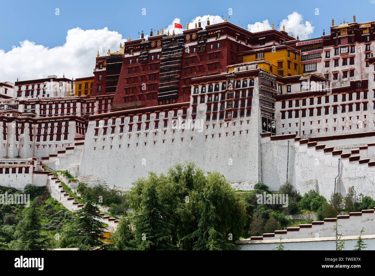 Close up of Potala Palace. On top of the palace waves the Chinese flag ...