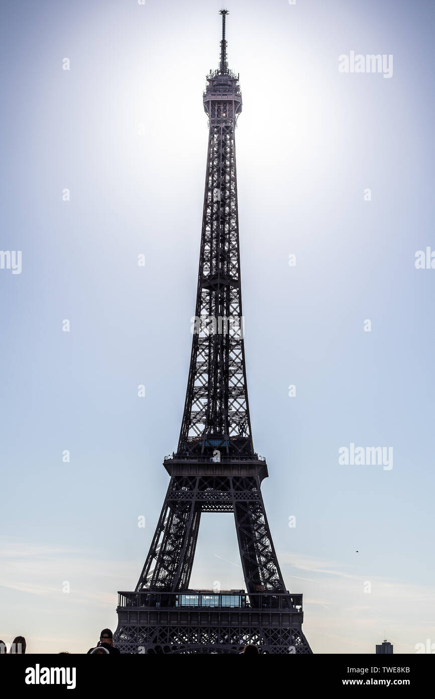 PARIS, FRANCE, Oct 2018 Paris Place du Trocadero with famous Eiffel Tower, sunrays passing through. Eiffel Tower is tallest structure in Paris Stock Photo