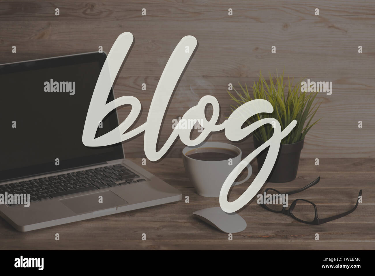 Blog text with computer keyboard, cup of coffee and plant pot. Wooden ...
