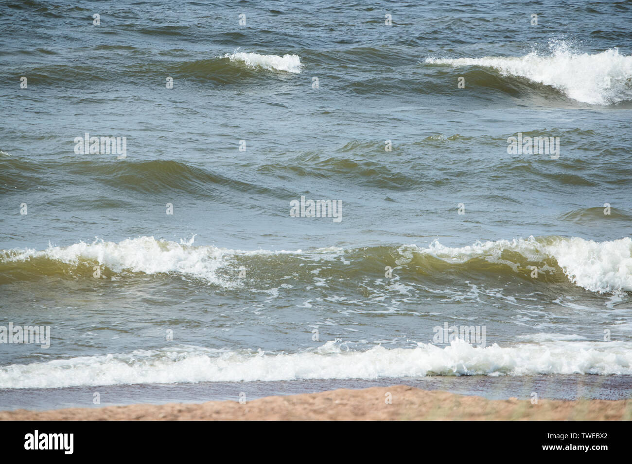 Sea waves sandy beach hi-res stock photography and images - Alamy