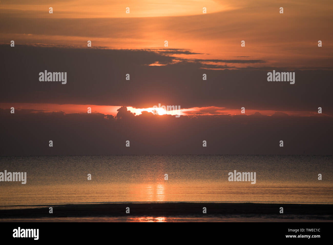 sunset on the sea in the summer season Stock Photo