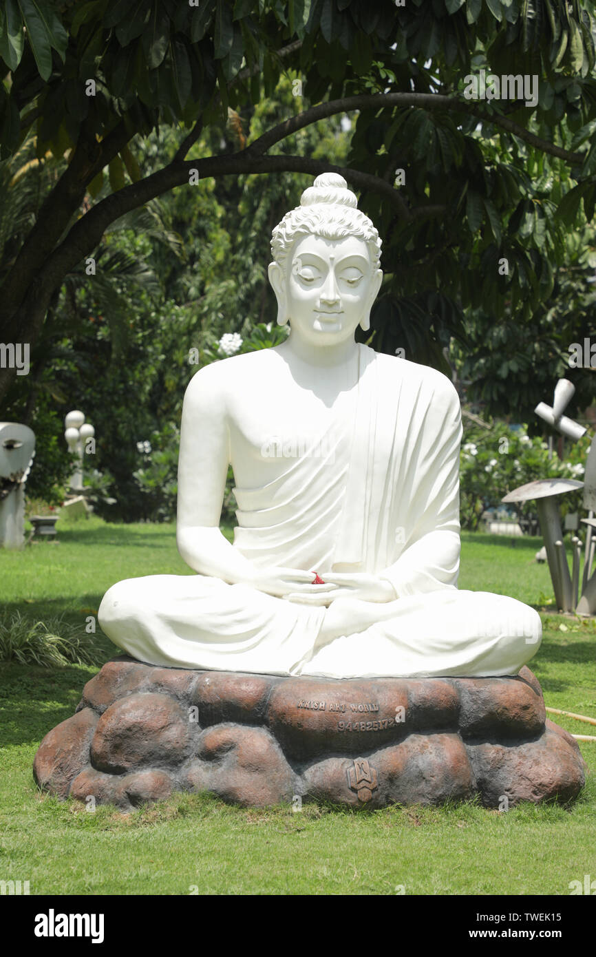 Bangalore, Karnataka IndiaJune 04 2019 White Buddha statue in
