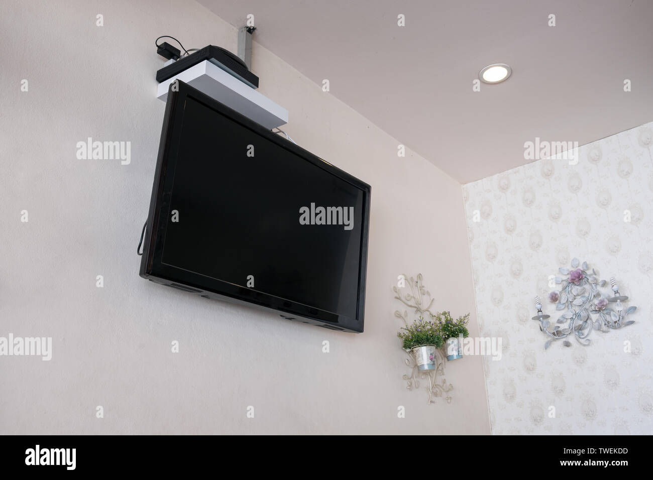 Flat Screen Tv Lcd On Wall With Decor Vintage Flower Stock Photo