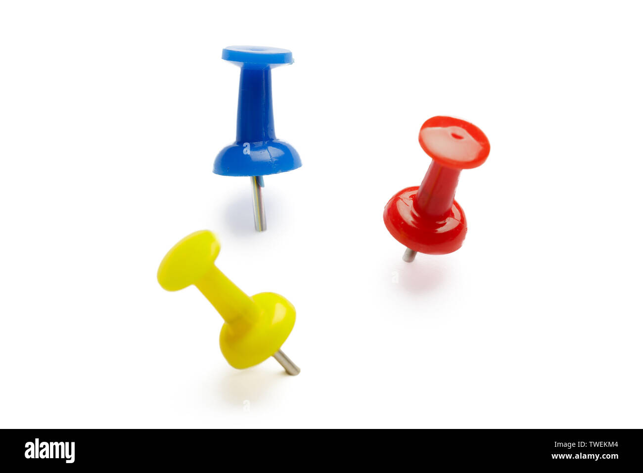 Push pins isolated on white background Stock Photo - Alamy