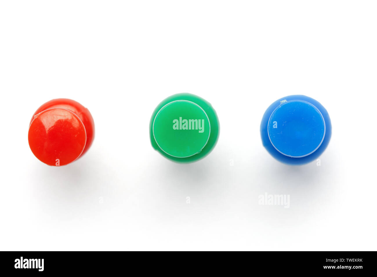 Push pins isolated on white background Stock Photo - Alamy