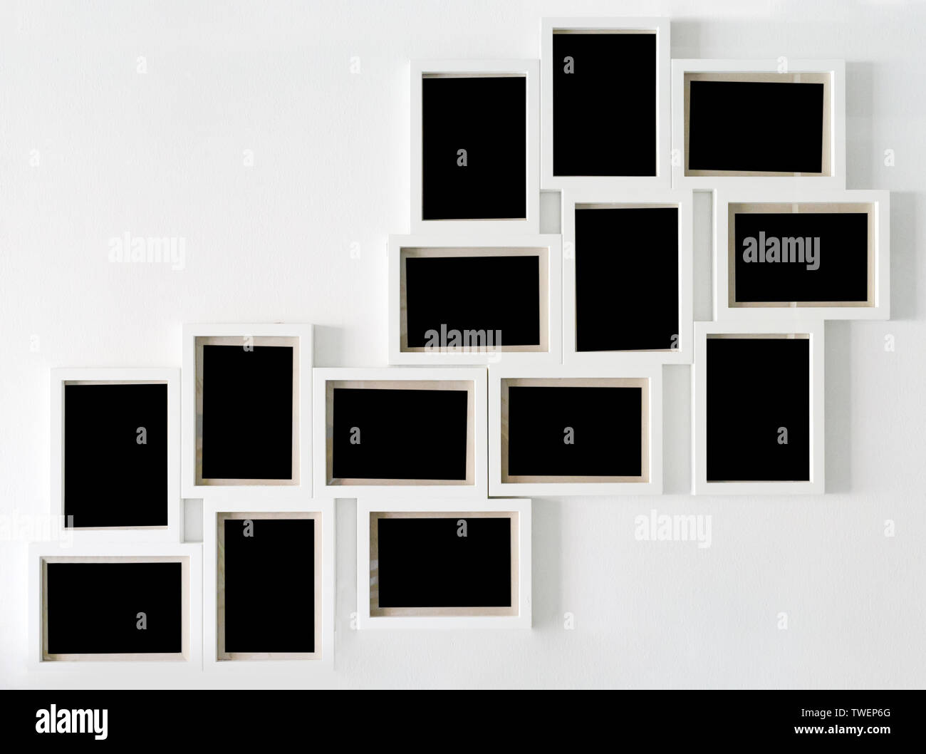Collection white picture frame and black decorative hanging on white