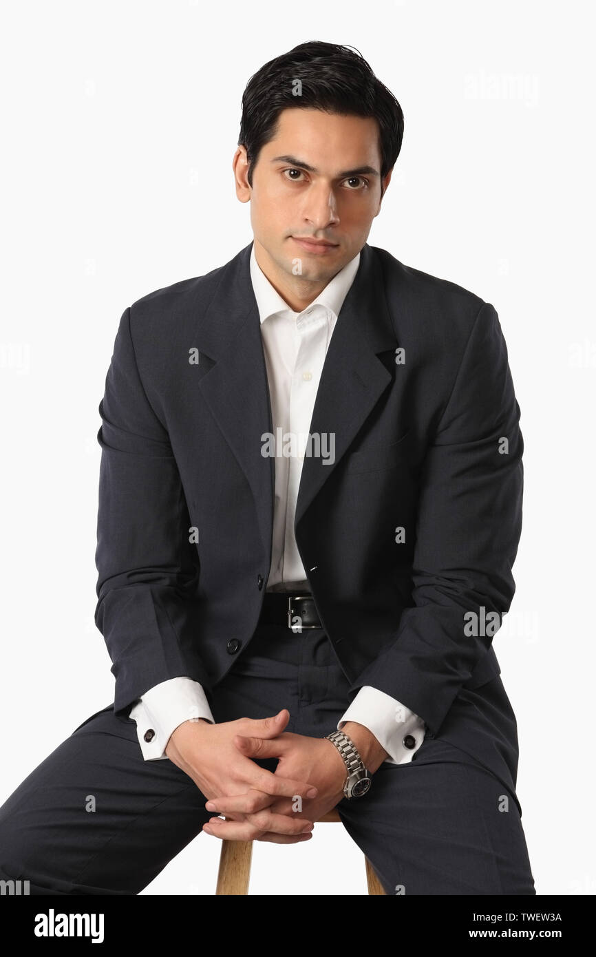 Employee sitting on stool hi-res stock photography and images - Alamy