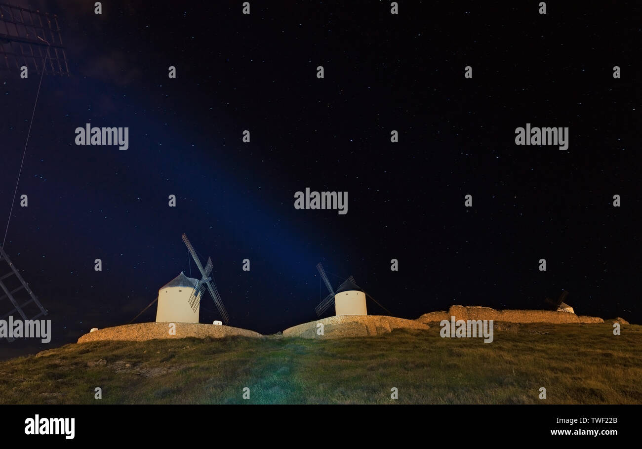 Windmills Don Quixote at night on the background of stars Stock Photo