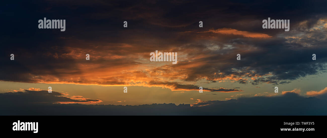 Sunset sky with clouds. Panorama Stock Photo - Alamy