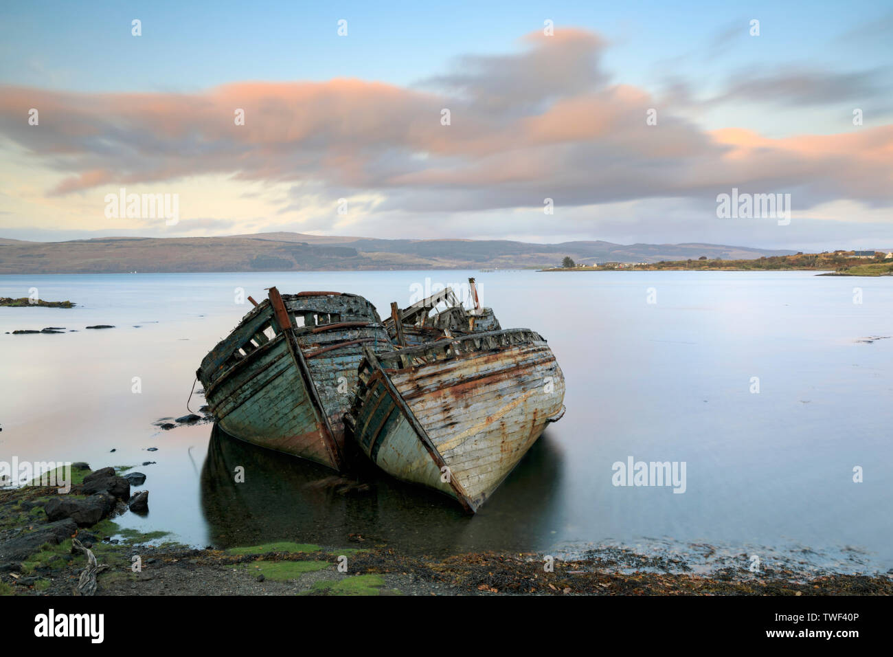 Abandoned boats at sunset. Stock Photo