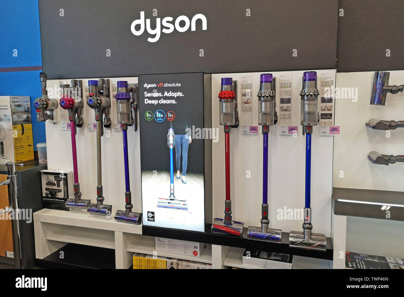 Dyson cordless vacuum cleaners on display in Curry's PC World in Stratford  upon Avon, Warwickshire. June 2019 Stock Photo - Alamy