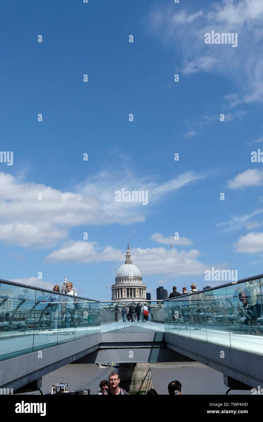 A view of Millennium bridge with St Paul’s at the background. Stock Photo