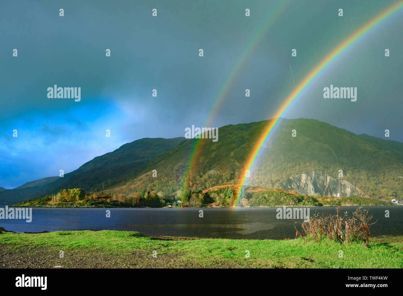 Rainbows at Taynuilt Pier. Stock Photo