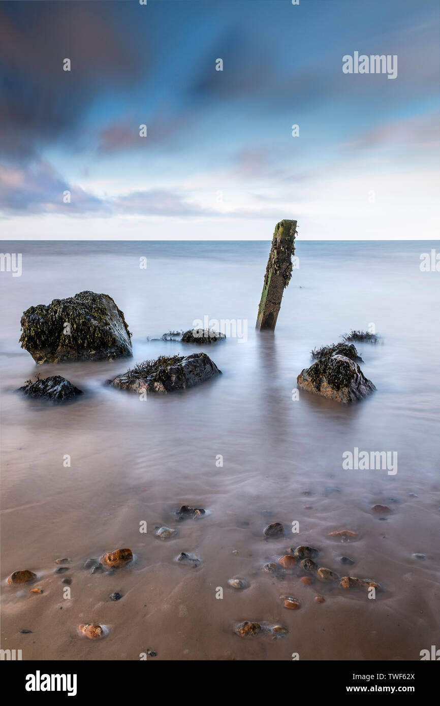 Remains of sea defences at Happisburgh on the Norfolk coast. Stock Photo